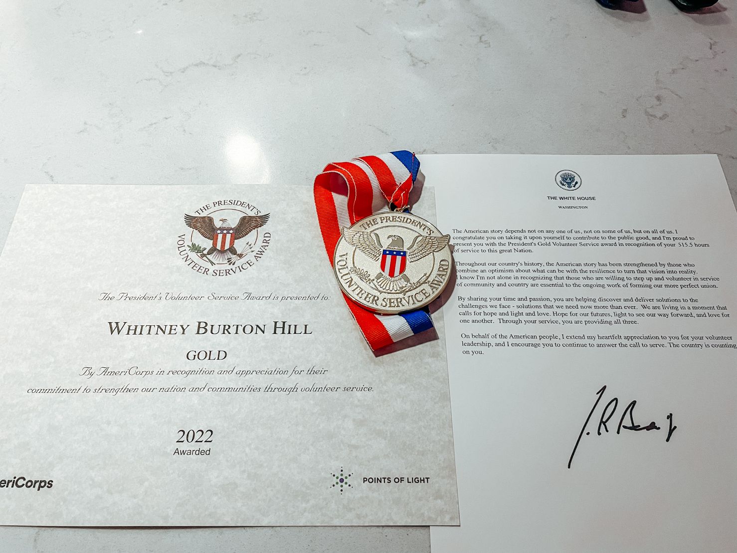 Whitney Hill's PVSA certificate and medal