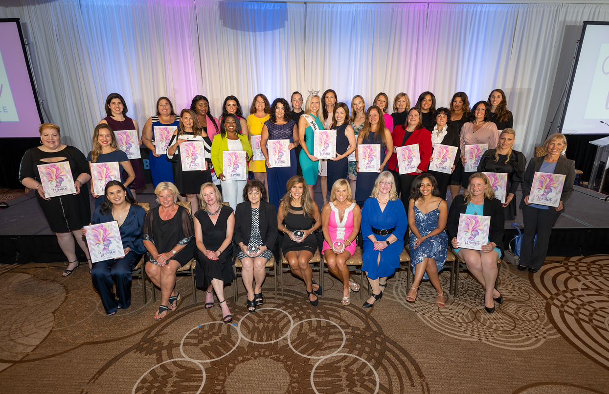 Sarah poses with fellow Women of Influence and Women to Watch. 