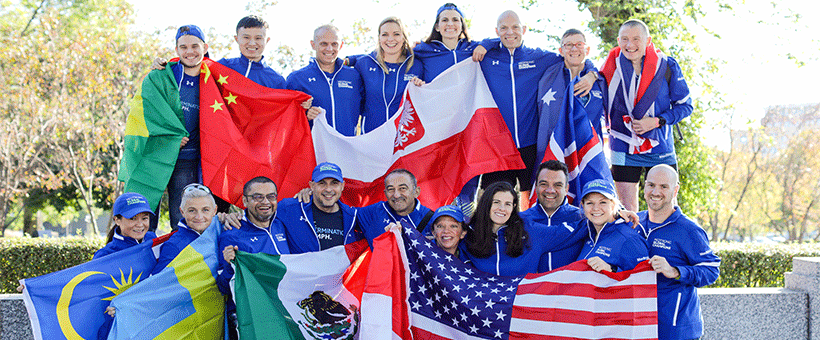 The Global Champions Team holding flags from their countries